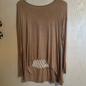 Women’s long sleeve high low blouse. Open, decorative back. Size L